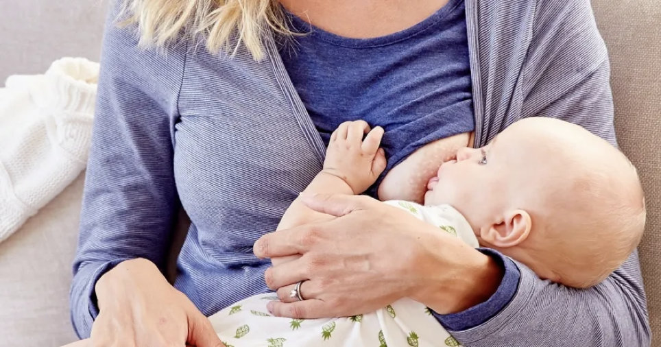 Mother breastfeeding baby