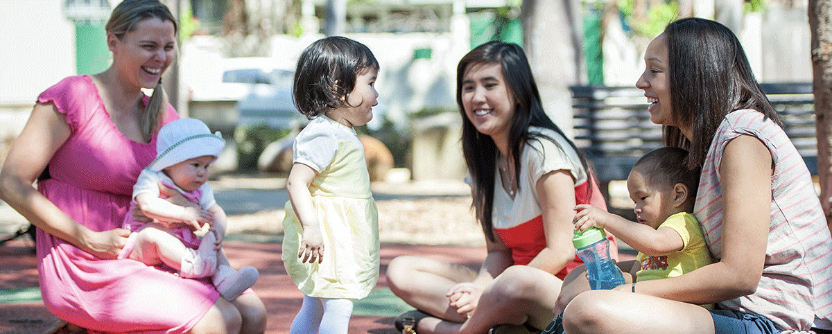 mothers group in the playground with their kids